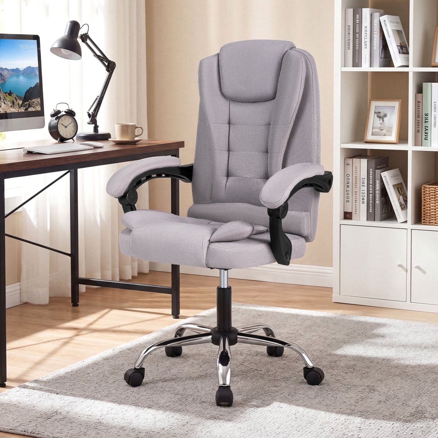 Black high back executive office chair with leather padded seat, linkage armrests, designed for big and tall users.