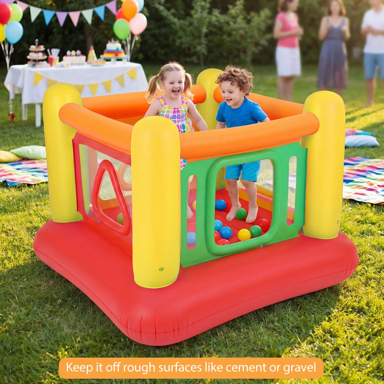 Blue inflatable kids' bounce house with transparent side walls, perfect for outdoor play, by Wilsons Home Store.