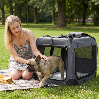Soft collapsible dog crate with mesh windows and three doors, ideal for travel and home use, by Direct by Wilsons Home Store.