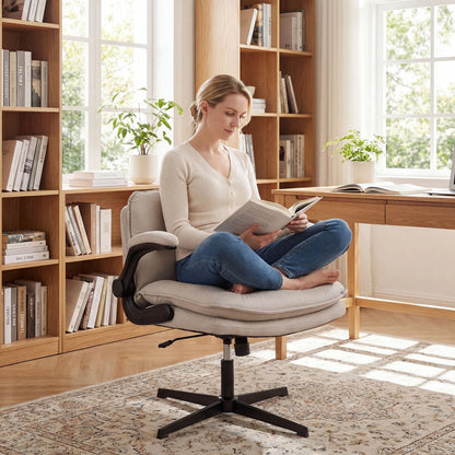 Beige criss cross ergonomic office chair with flip-up arms, adjustable height, wide backrest, and padded seat for comfort.