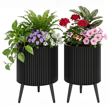 Set of two decorative flower pots with stands and drainage holes, suitable for outdoor garden or raised bed planting.