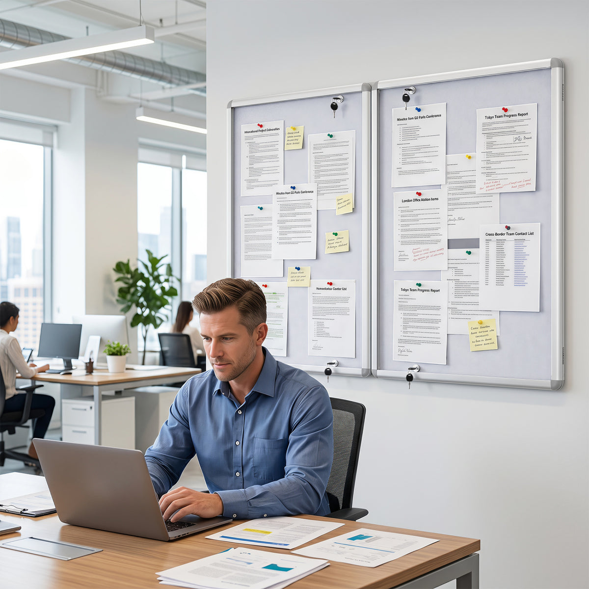 Lockable silver cork notice board with aluminum frame, enclosed bulletin board for home office use by Wilsons Home Store.