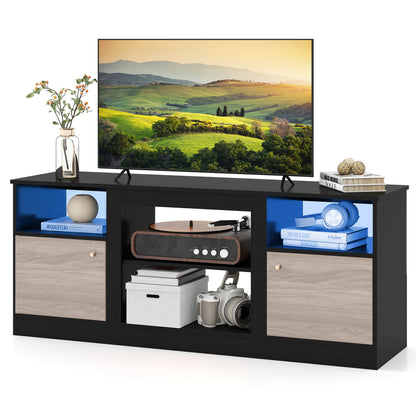 Black entertainment center with adjustable shelf and open compartment for 65-inch TVs, modern furniture for living room use.