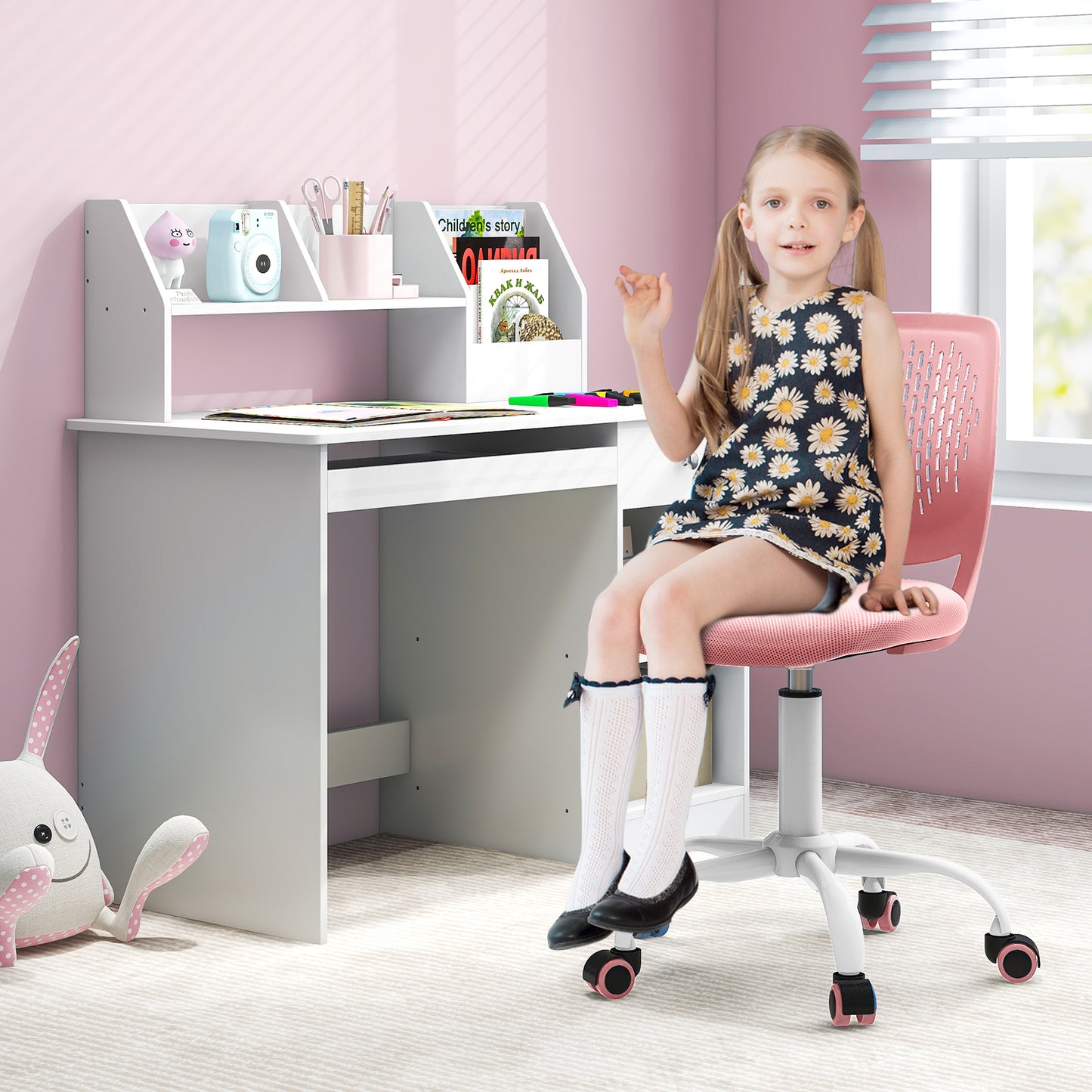 Light pink ergonomic children's study chair with adjustable height and supportive design for toddlers and kids.