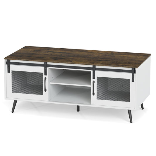 Rustic brown farmhouse coffee table with sliding doors and adjustable shelf, ideal for living room decor.
