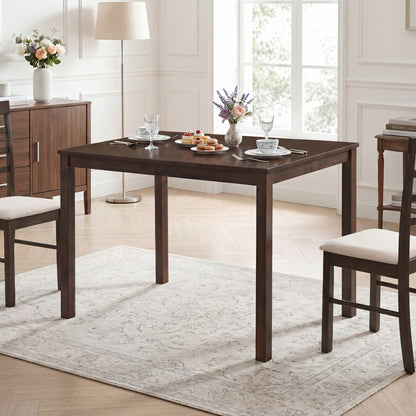 Brown farmhouse kitchen table for 4 with solid rubber wood frame, ideal for dining rooms, by Wilsons Home Store.