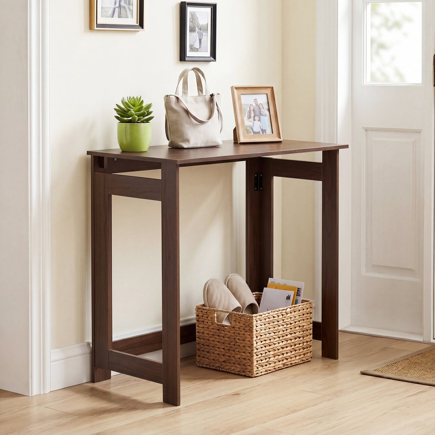 Black folding console table with foldable legs, ideal for entryway furniture, by Direct by Wilsons Home Store.