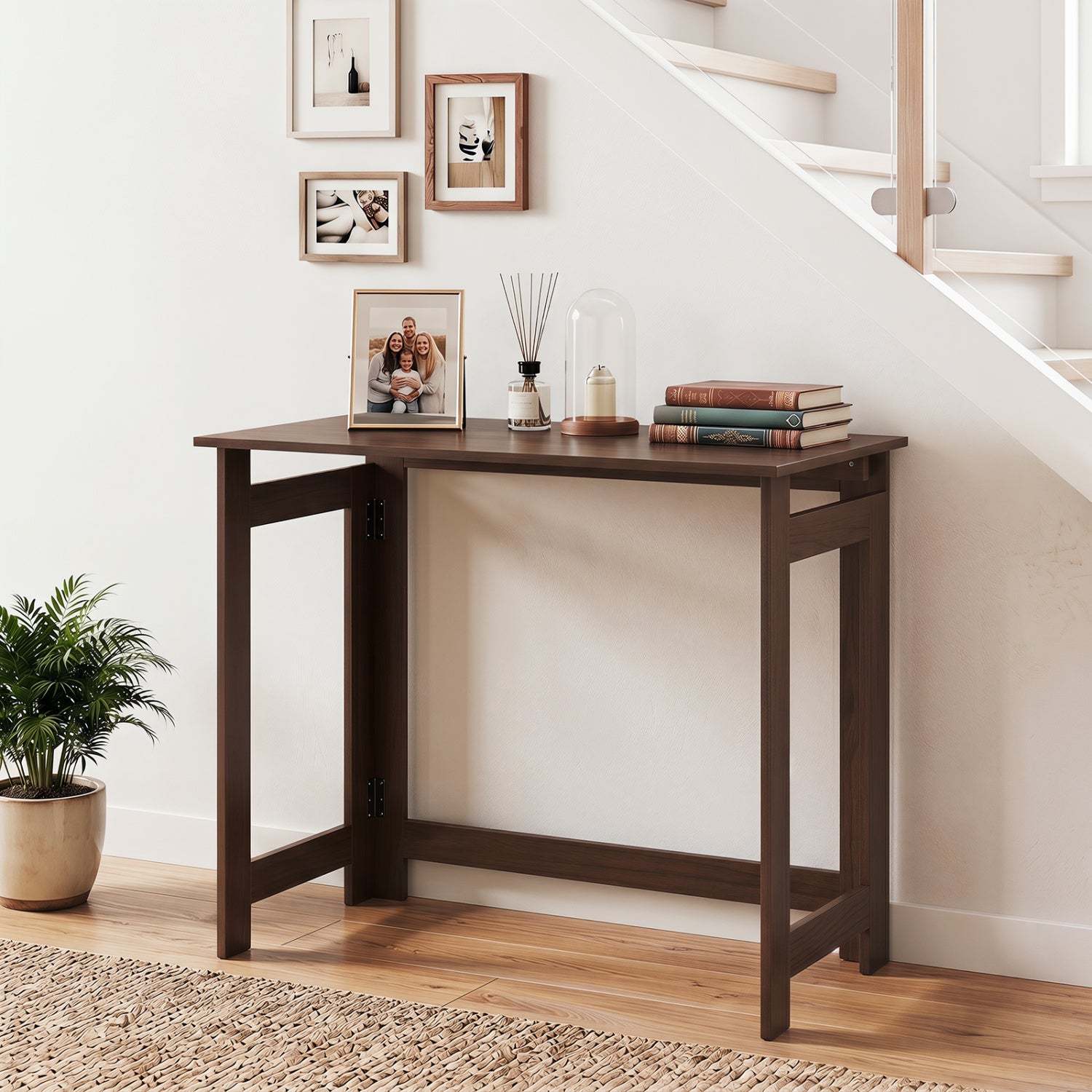 Black folding console table with foldable legs, ideal for entryway or living space, by Wilsons Home Store.