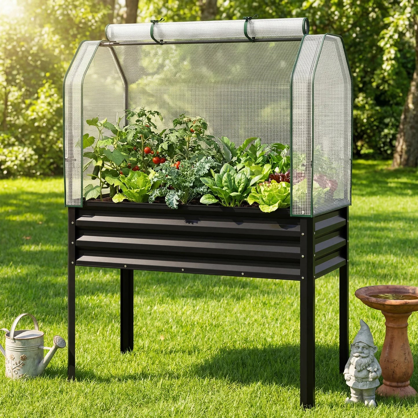 Galvanized raised garden bed with legs and green greenhouse cover, ideal for vegetables and flowers in outdoor garden spaces.