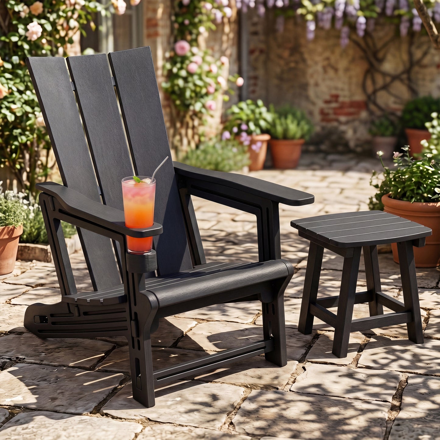 Black HDPE outdoor Adirondack chair with built-in cup holder, designed for patio and outdoor seating.