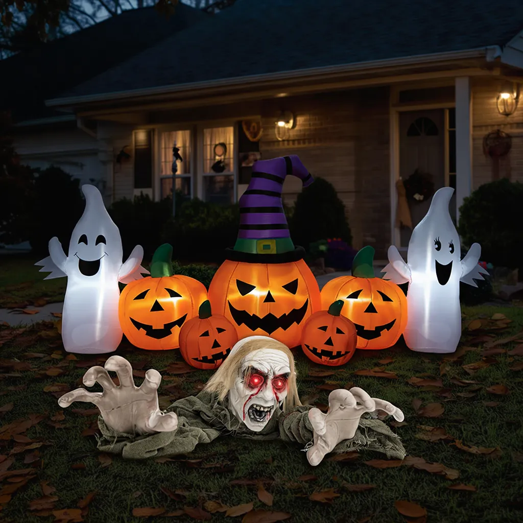 Groundbreaker climbing zombie with inflatable pumpkins Halloween yard decor, featuring spooky zombie figure and festive pumpkin inflatables.