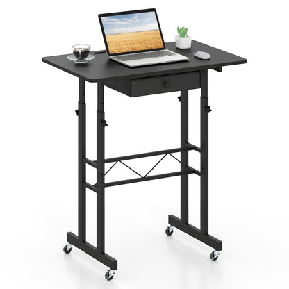 Black height adjustable laptop desk with fabric drawer and lockable wheels, suitable for home office use.