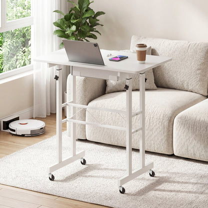 Black height adjustable laptop desk with fabric drawer, tablet holder, and lockable wheels for versatile home office use.