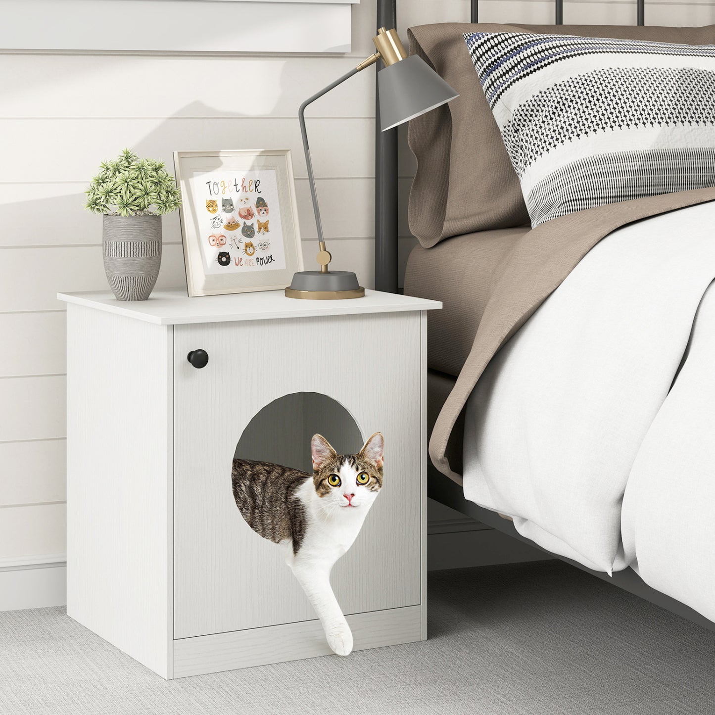 White modern cat litter box enclosure by Wilsons Home Store, designed for small to large cats, with sleek, enclosed housing.