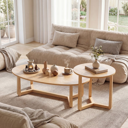 Set of two nesting coffee tables with wood veneered tops and solid rubber wood legs, natural finish for living room decor.