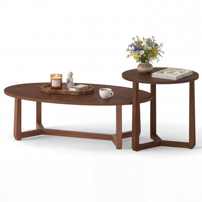 Set of two nesting coffee tables with wood veneered tops and solid rubber wood legs in natural finish.