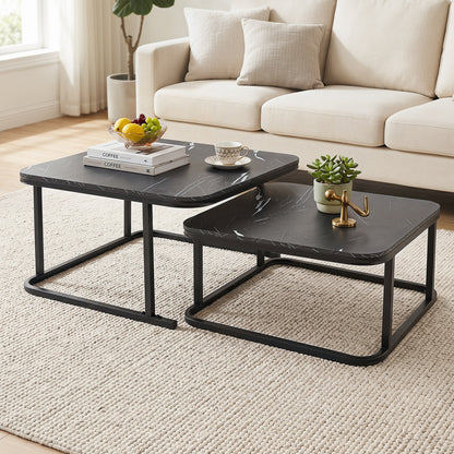 Set of two nesting coffee tables with faux marble tops and black metal frames for living room decor.