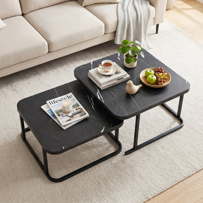 Set of two nesting coffee tables with faux marble tops and black metal frames, ideal for living room decor.