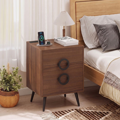 Modern black nightstand with 3 drawers, power outlets, and cable hole for bedside bedroom storage.