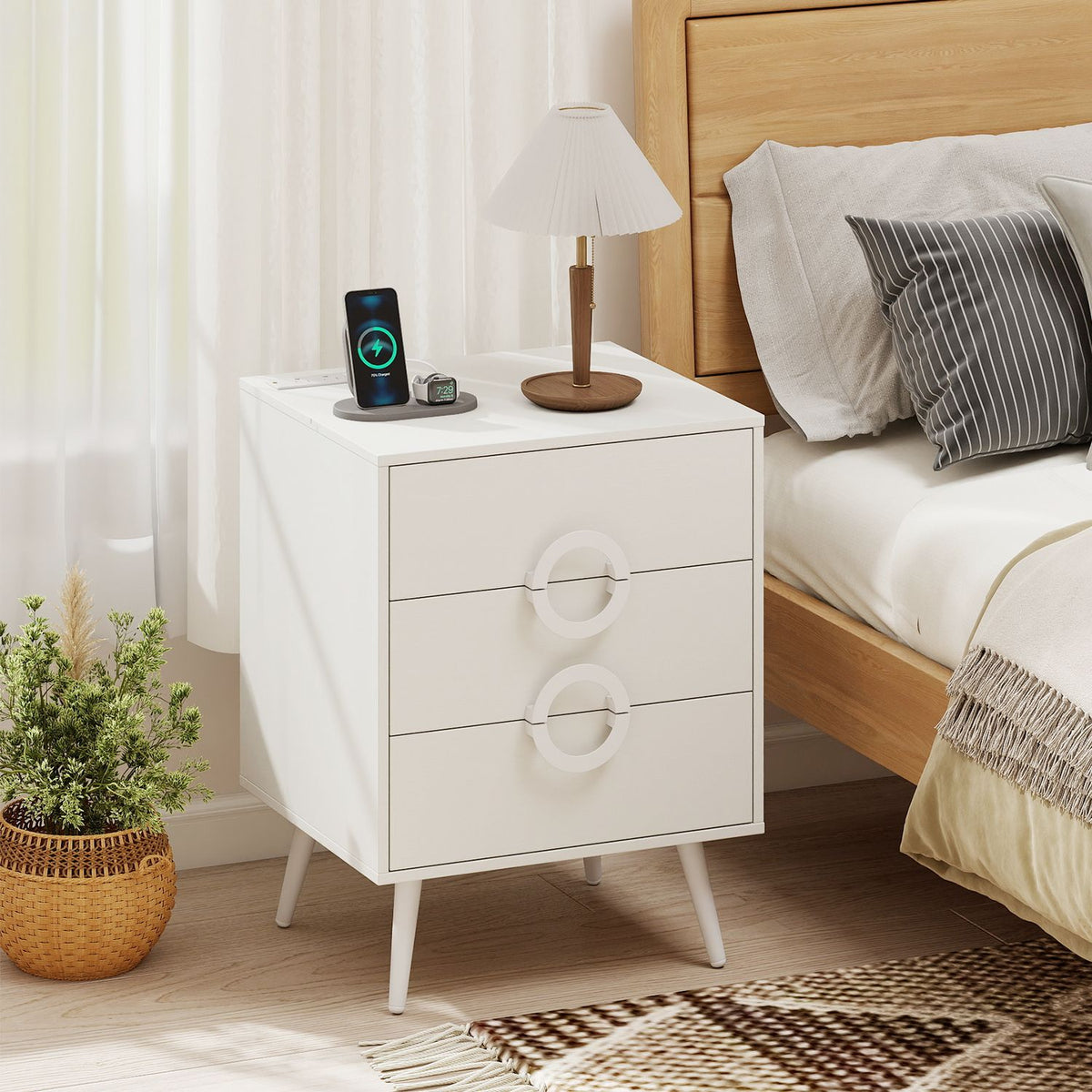 Black modern nightstand with 3 drawers, built-in power outlets, and cable hole for bedside storage.