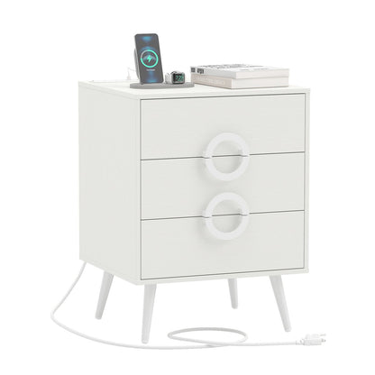 Black modern nightstand with 3 drawers, power outlets, and cable hole, ideal for bedroom storage and convenience.