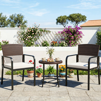 Set of four beige outdoor dining chairs with padded cushions and adjustable feet, ideal for patio seating.