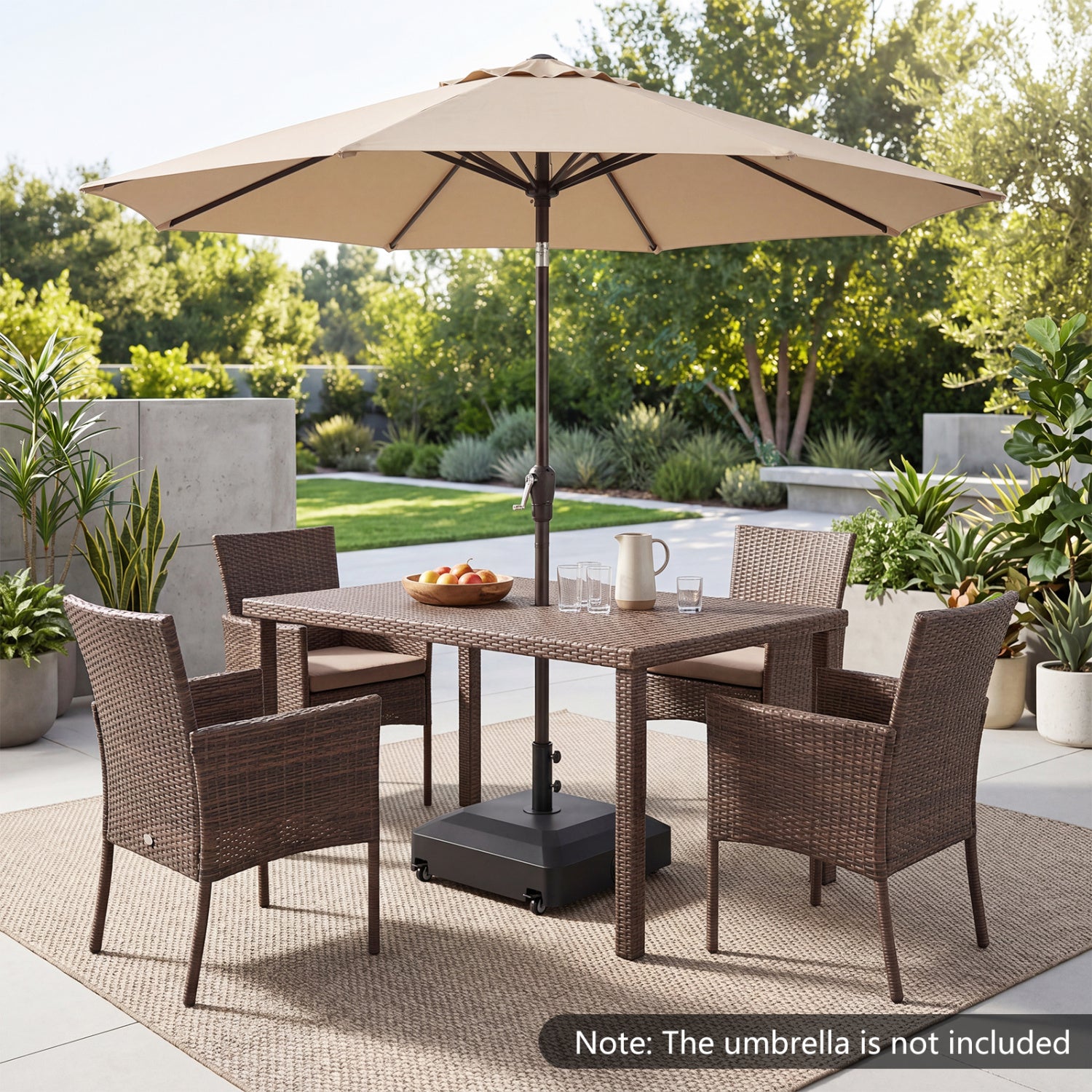 Black outdoor fillable umbrella base with wheels, water and sand weighted stand for outdoor umbrella support.