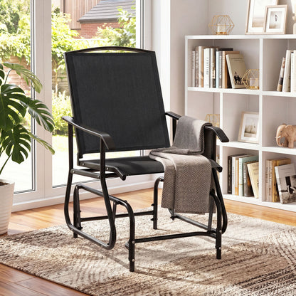 Black outdoor glider chair with metal frame and armrests, perfect for patio seating and outdoor relaxation.