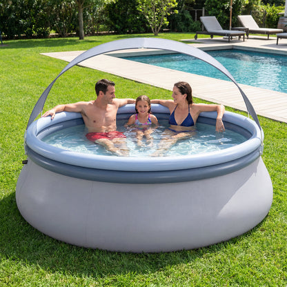 Inflatable outdoor swimming pool with sunshade canopy from Wilsons Home Store, perfect for backyard summer fun.