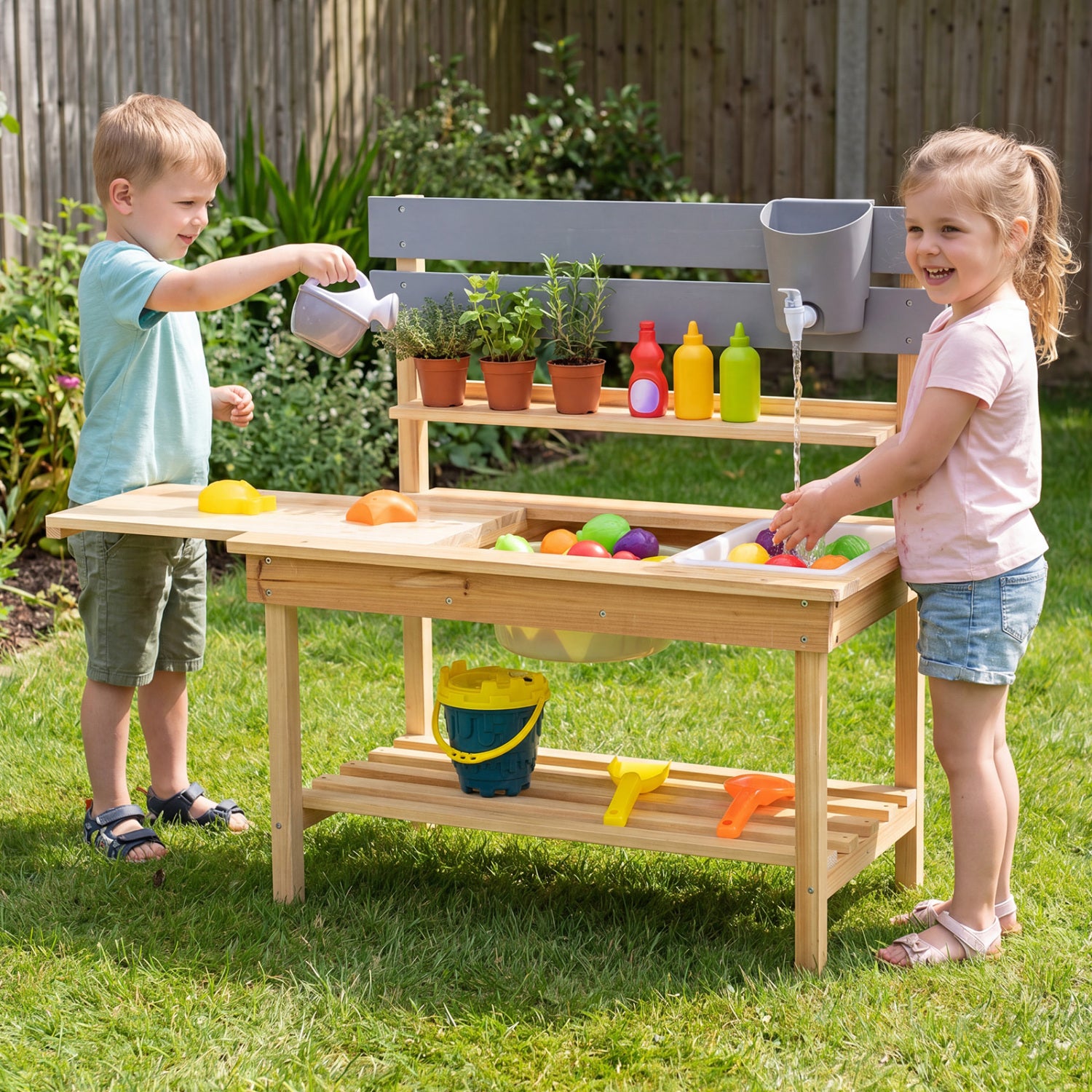Outdoor kids mud kitchen with extended tabletop and water tank, natural wood play set for imaginative outdoor pretend cooking.
