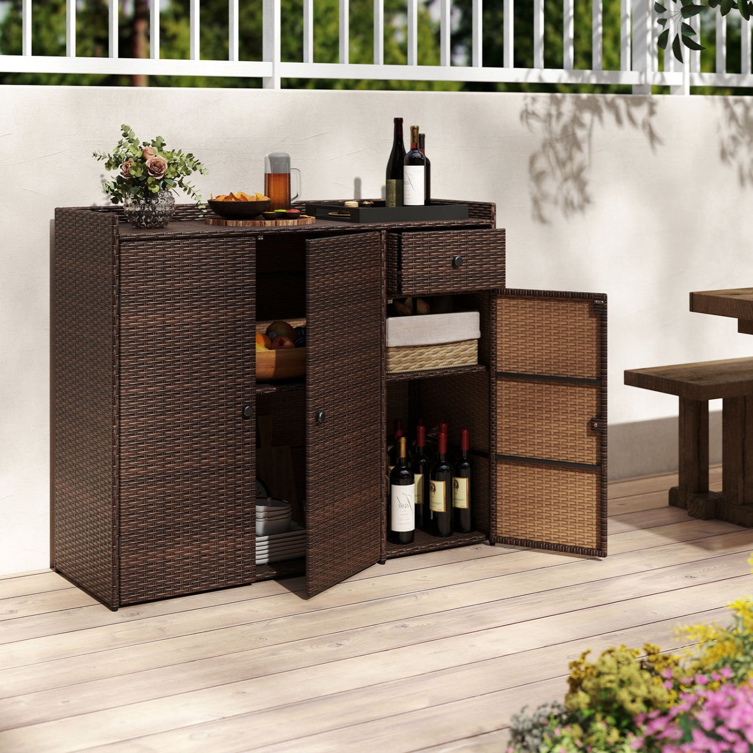 Brown outdoor PE wicker storage cabinet with 3 doors, adjustable shelves, and a drawer, ideal for outdoor storage.