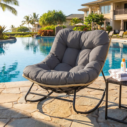 Gray outdoor papasan rocking chair with thick cushioned seat for patio relaxation, designed for outdoor patio and garden use.