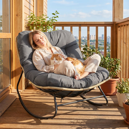 Gray outdoor papasan rocking chair with thick cushioned seat for patio, perfect for outdoor seating and relaxation.