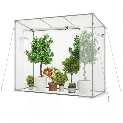 Portable outdoor walk-in greenhouse with white PE cover and roll-up zipper door, ideal for garden use.