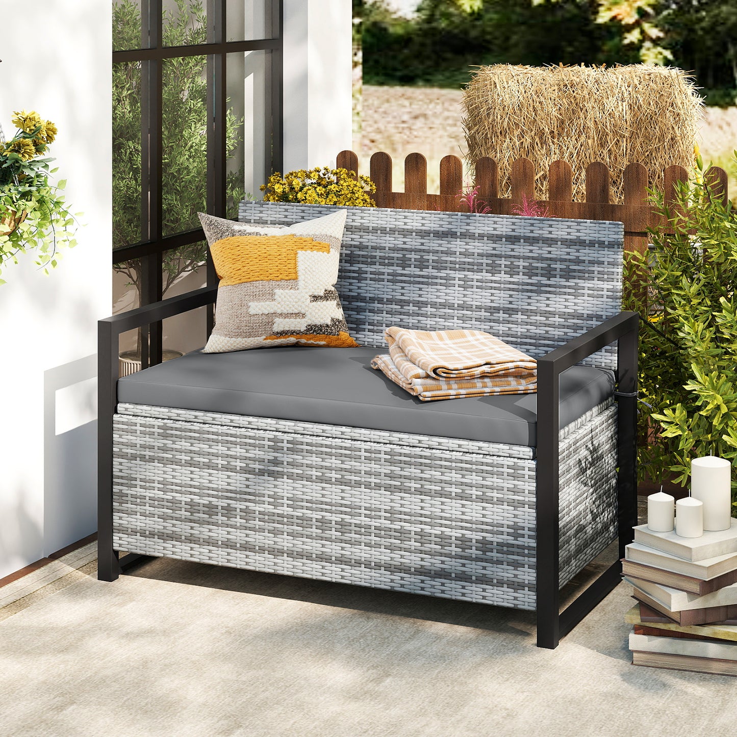 Outdoor wicker patio storage bench with built-in storage and loveseat design, perfect for outdoor patio and garden organization.