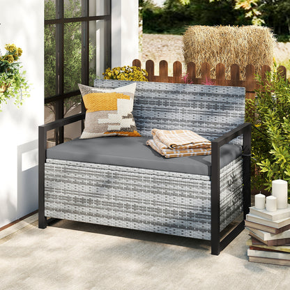 Outdoor wicker patio storage bench with built-in storage and loveseat design, perfect for outdoor patio and garden organization.