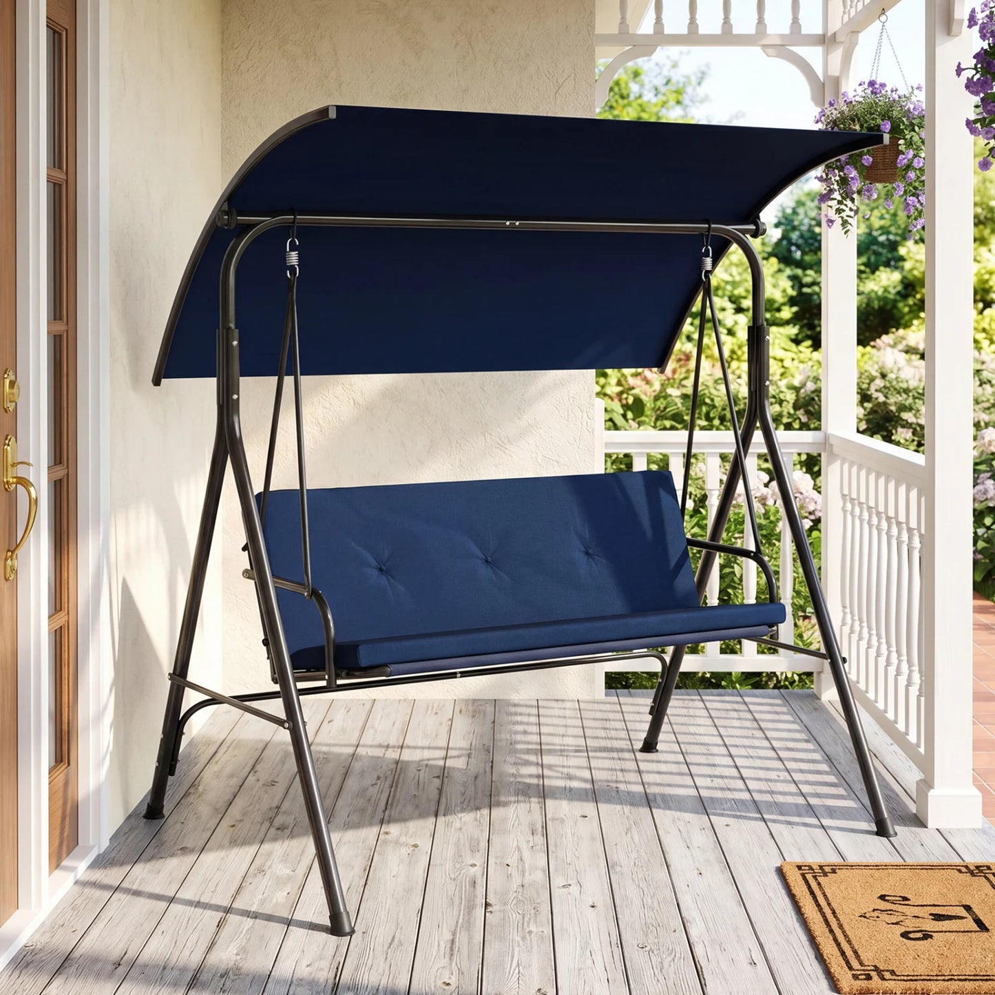 Beige outdoor patio swing chair with adjustable canopy, removable cushion, and metal stand for porch relaxation.