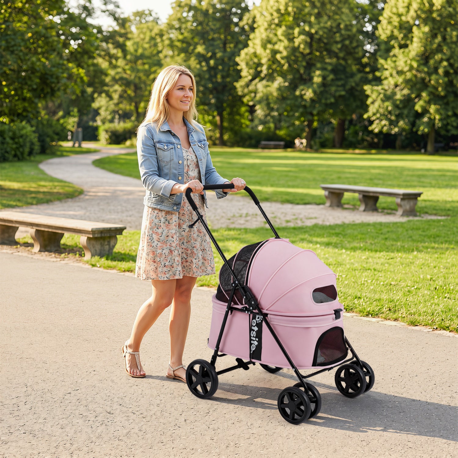Foldable black pet stroller for small and medium dogs with canopy and one-step rear brake, designed by Direct by Wilsons Home Store.