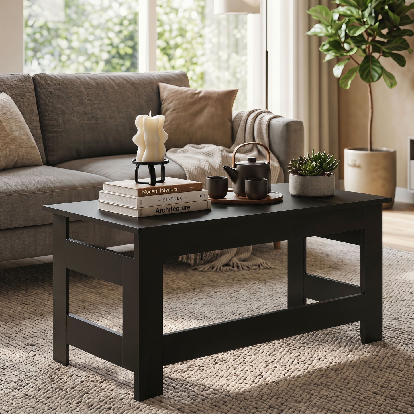 Black portable low floor table with foldable legs, ideal for living room use, by Wilsons Home Store.