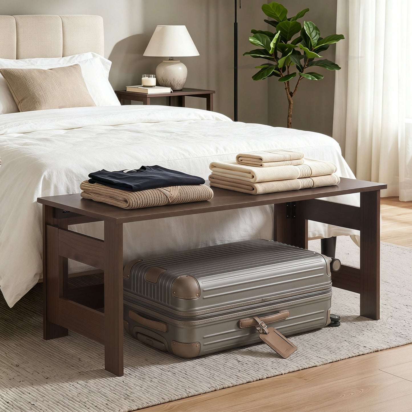 Black portable low floor coffee table with foldable legs, ideal for living room use, from Wilsons Home Store.