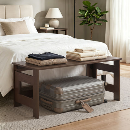 Black portable low floor coffee table with foldable legs, ideal for living room use, from Wilsons Home Store.
