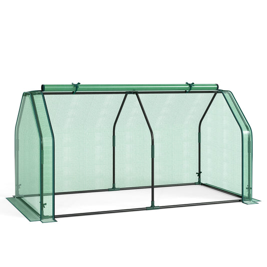 Portable mini greenhouse with PE cover and zippered roll-up door, ideal for small vegetable gardens, by Direct by Wilsons Home Store.