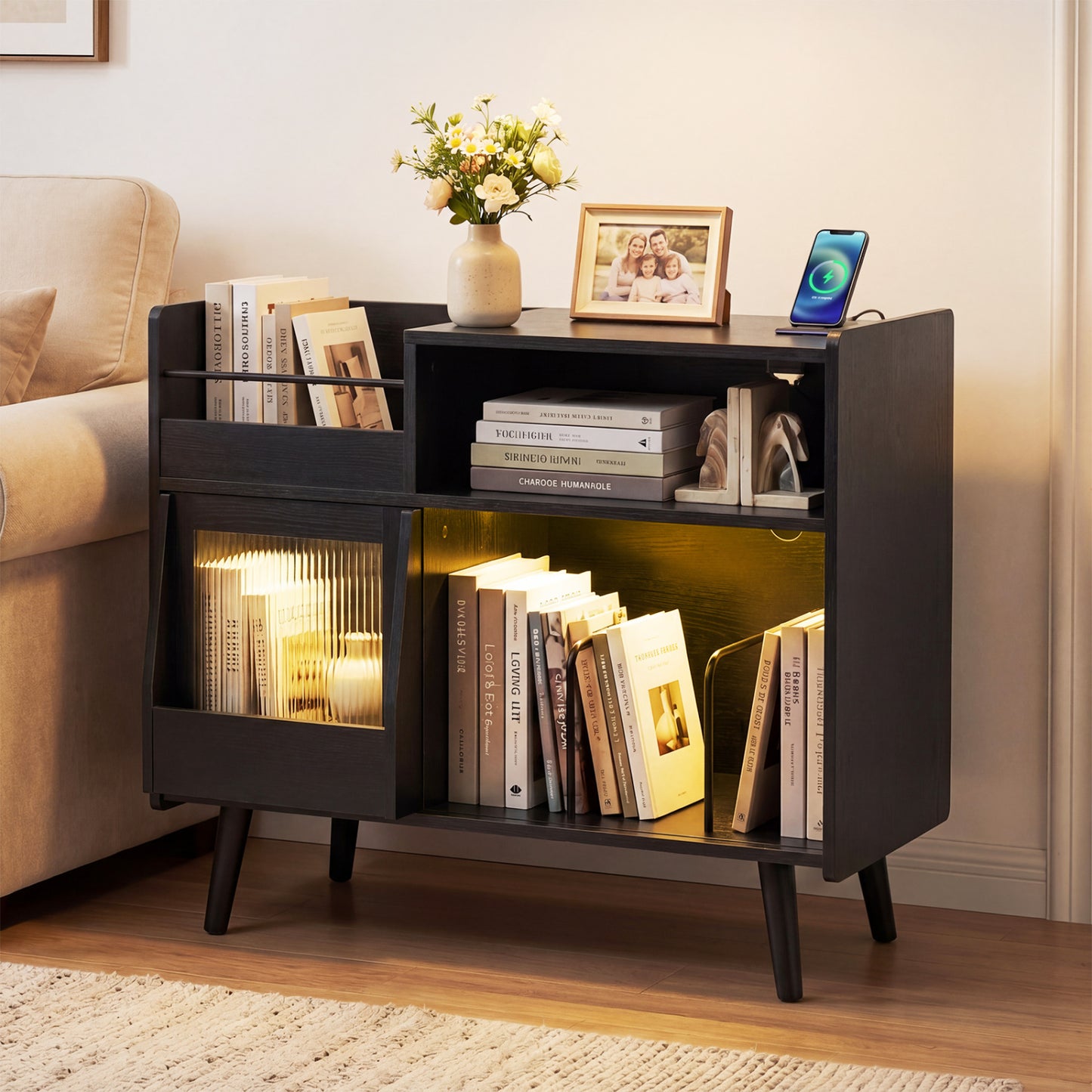 Black record player stand with LED lighting and built-in power outlets, ideal as a stylish side table for a living room.