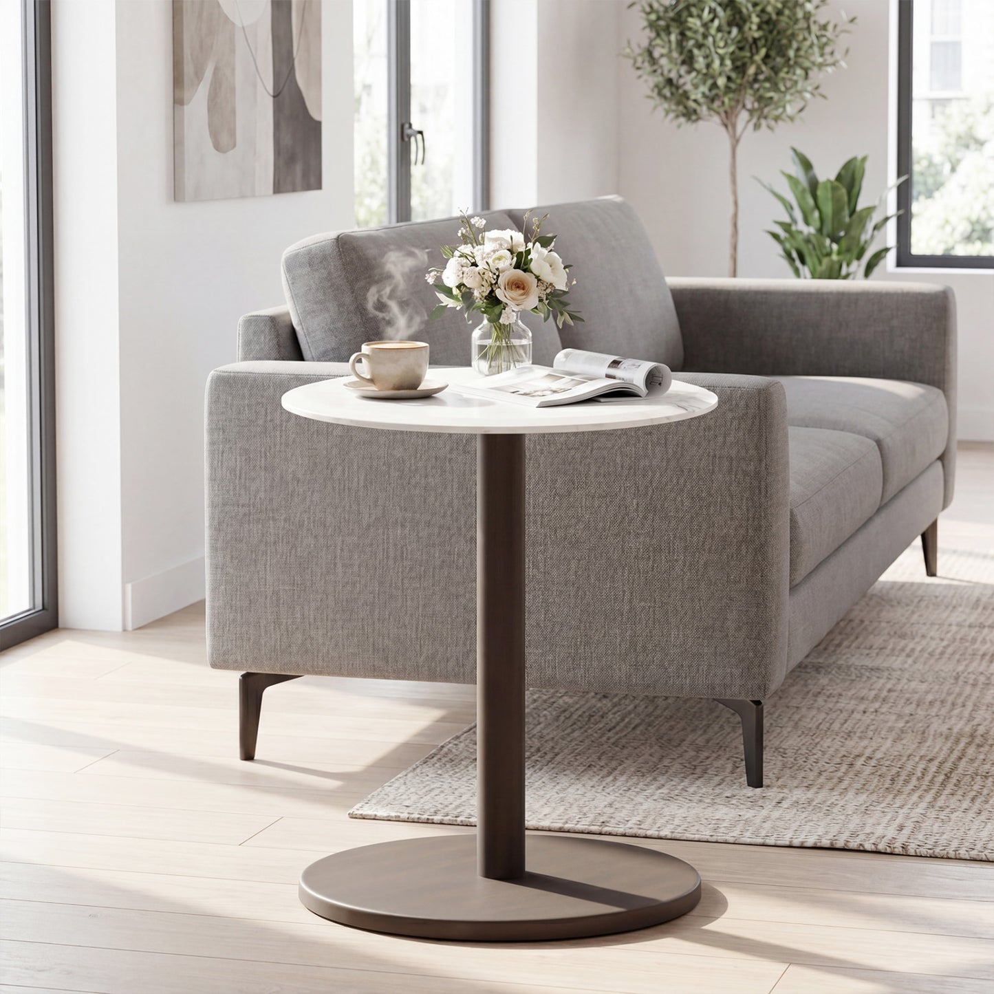Round marble side table with black and white stone finish and wooden accents, ideal as a living room end or pedestal table.