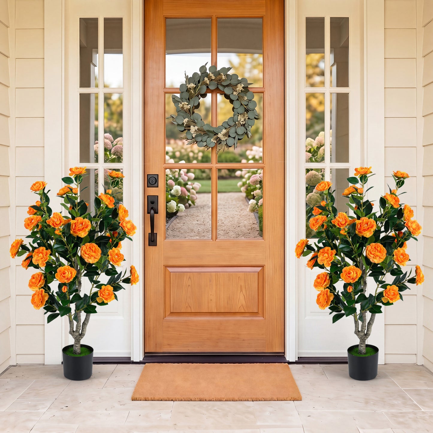 Set of 2 39.5-inch artificial camellia trees with orange blossoms in cement pots, perfect for home decoration.