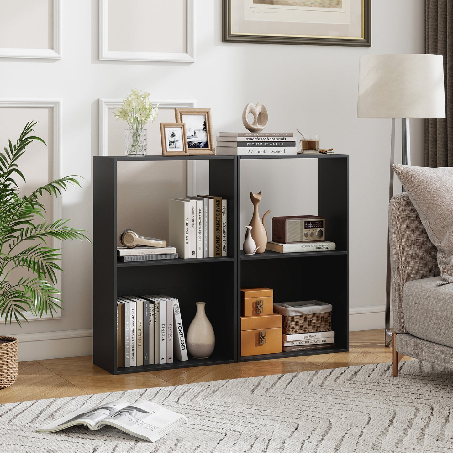 Set of two black 3-tier bookshelves with open storage compartments, ideal for home office or living room display.