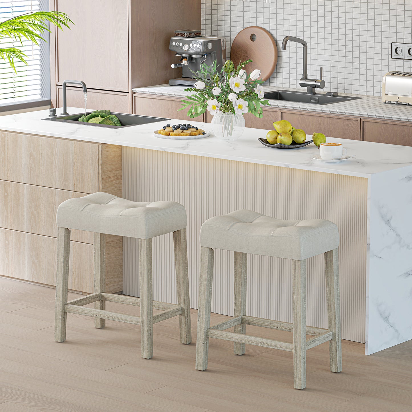 Set of 2 upholstered light gray counter height bar stools with curved saddle seats from Wilsons Home Store.