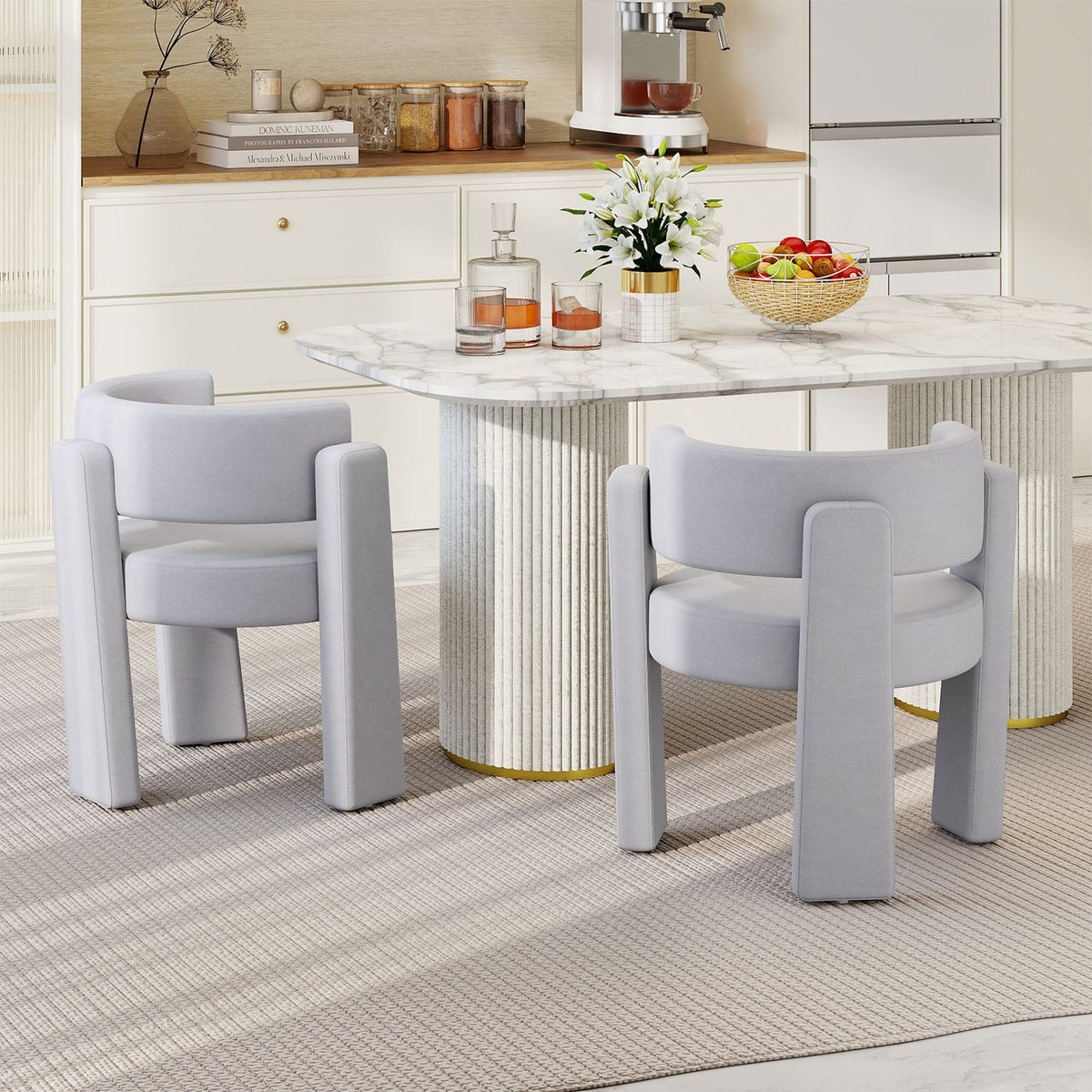 Set of 2 modern gray velvet upholstered armchairs with barrel design, perfect as accent chairs for living rooms.