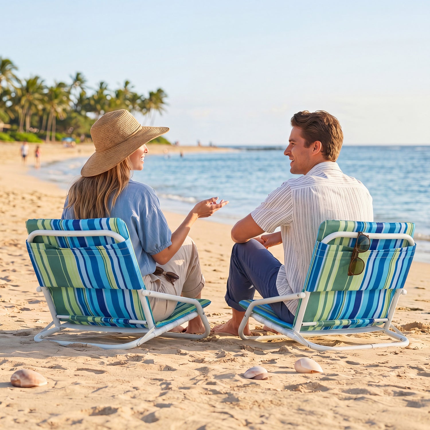 Set of 2 Wilsons Home Store folding beach chairs with sponge-padded seats, ideal for outdoor camping and patio lounging.