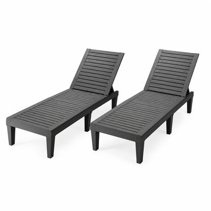 Set of 2 black outdoor chaise lounge chairs with 5-position adjustable backrests, ideal for patio outdoor seating.